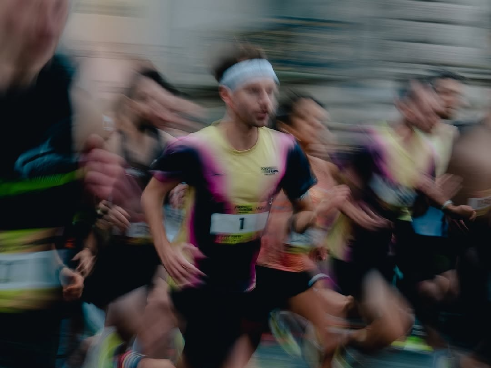 Runner wearing bib number 1 during a race